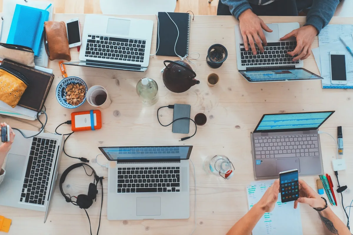 People working at laptops in a collaborative space