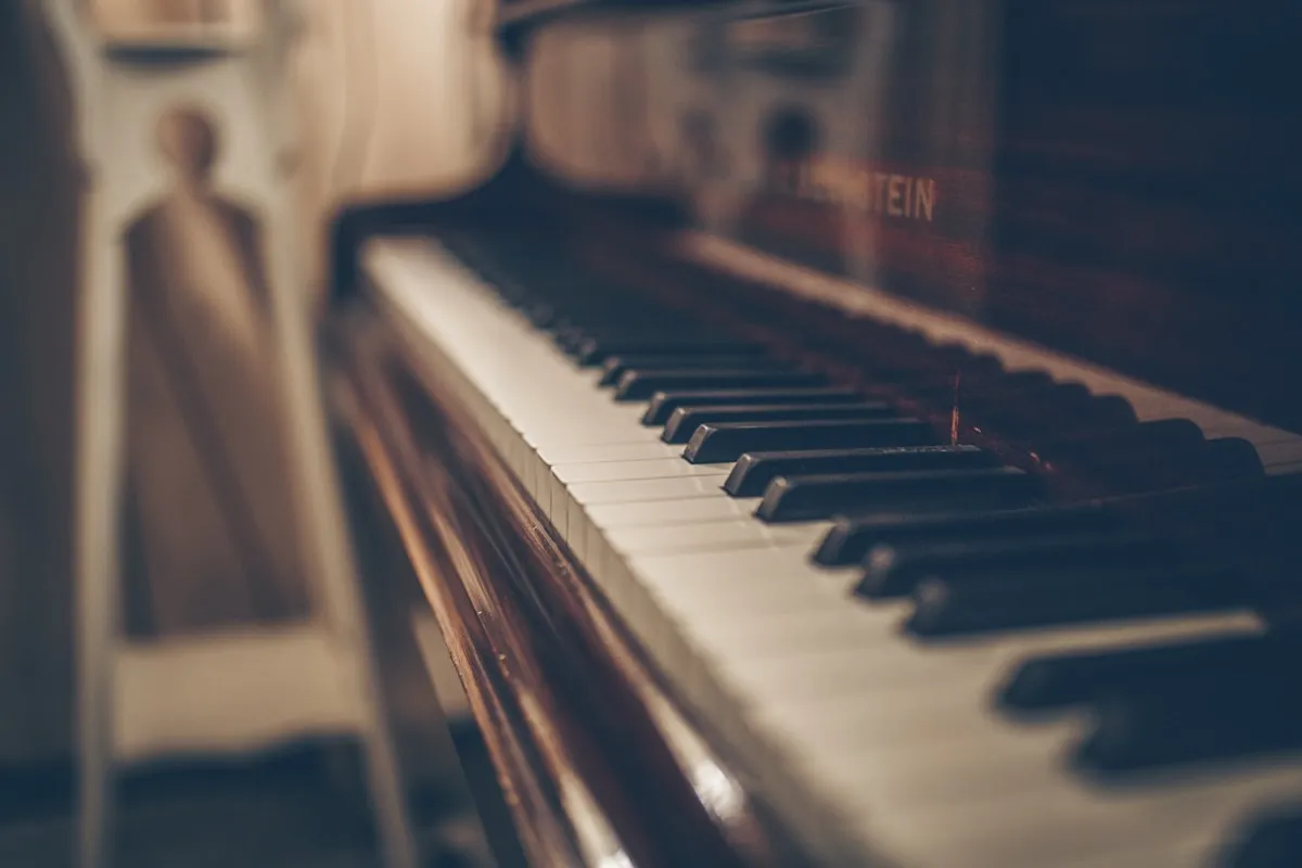 Piano keys in soft lighting — slow piano is among the most effective sleep music
